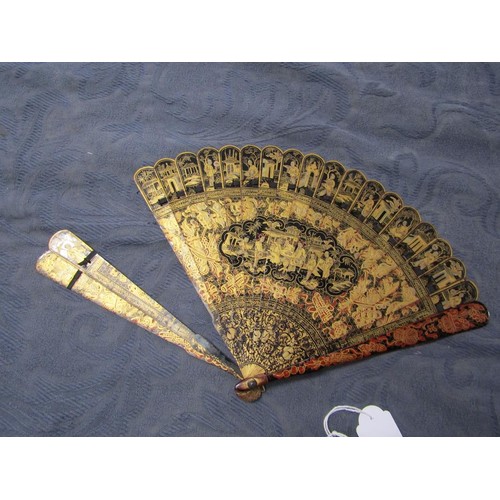 62 - A Japanese Meiji period tortoiseshell fan, chinoiserie decorated with figures, buildings and foliate... 