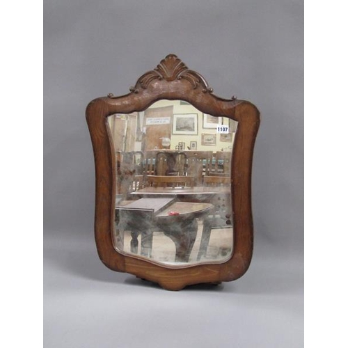 1107 - CARVED WOOD FRAMED WALL MIRROR 66 x 48 cms