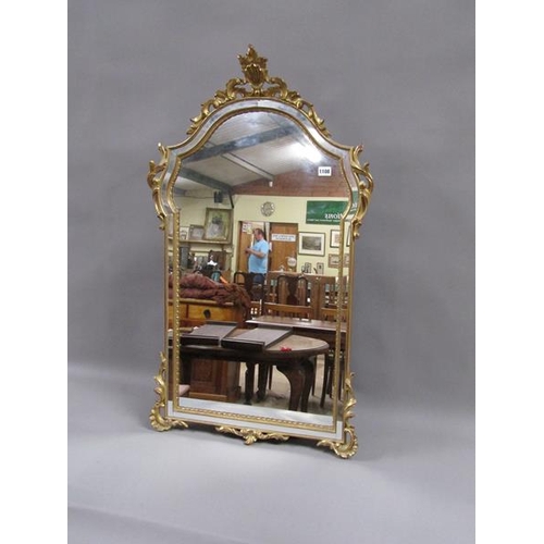 1108 - GILT WOOD WALL MIRROR WITH SHAPED MIRRORED FRAME 106 x 61 cms