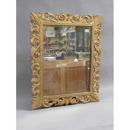 1156 - CARVED GILT WOOD AND STUCCO WALL MIRROR IN 18C STYLE, 80CM X 64CM