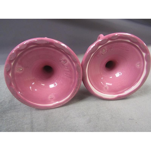 1193 - PAIR OF PINK GLAZED WARDLE CERAMIC CANDLESTICKS 23cms H