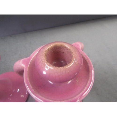 1193 - PAIR OF PINK GLAZED WARDLE CERAMIC CANDLESTICKS 23cms H