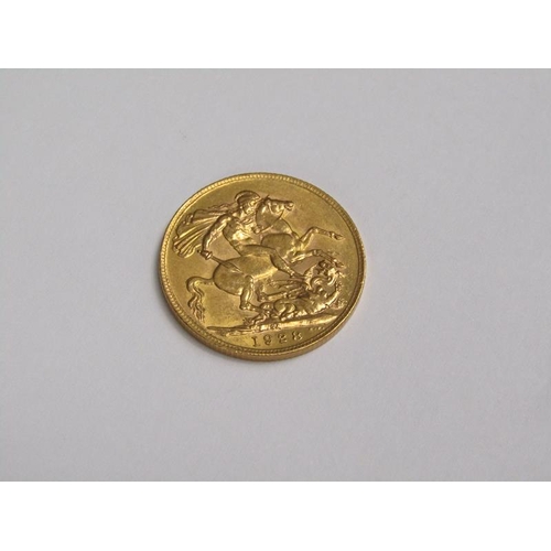 104 - A 1928 gold sovereign.