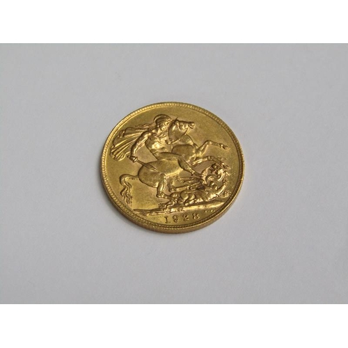 104 - A 1928 gold sovereign.