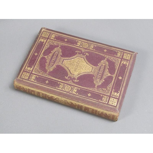13 - A book - The Princess, a Medley by Alfred Tennison with twenty six illustrations, printed in London ... 