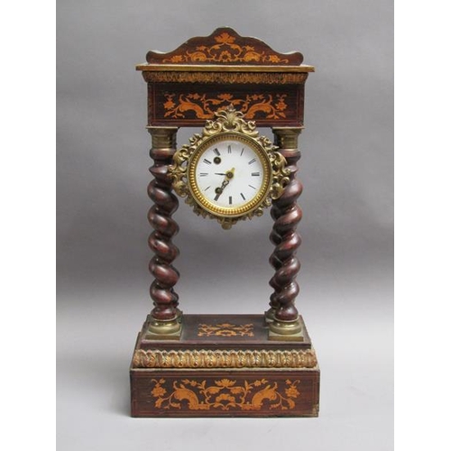 27 - A mid 19c French portico clock, the movement held between four barley sugar twist columns which stan... 