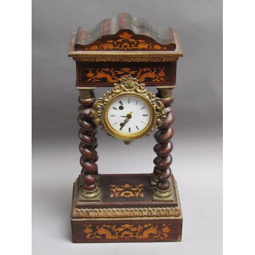 27 - A mid 19c French portico clock, the movement held between four barley sugar twist columns which stan... 