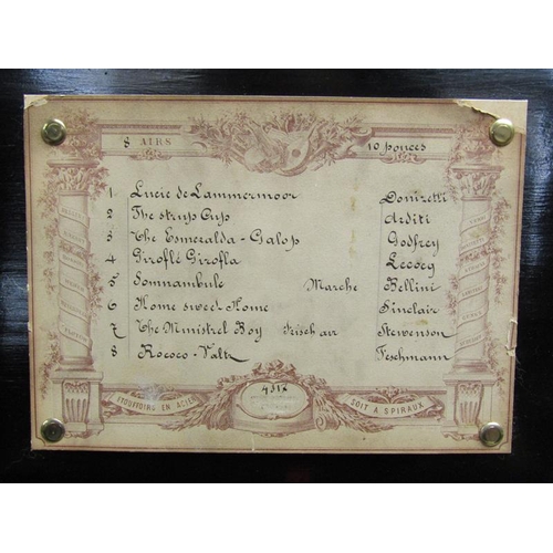 32 - A late 19c Swiss music box playing eight airs on a 27cm long pinned barrel with a seventy four tooth... 