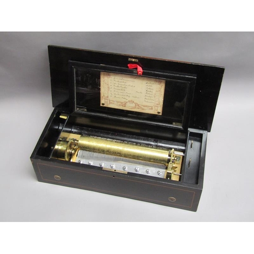 32 - A late 19c Swiss music box playing eight airs on a 27cm long pinned barrel with a seventy four tooth... 