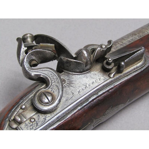 24 - An English flintlock pistol with 6.25in barrel engraved Harcourt, Ipswich, stock marked Harcourt.  W... 
