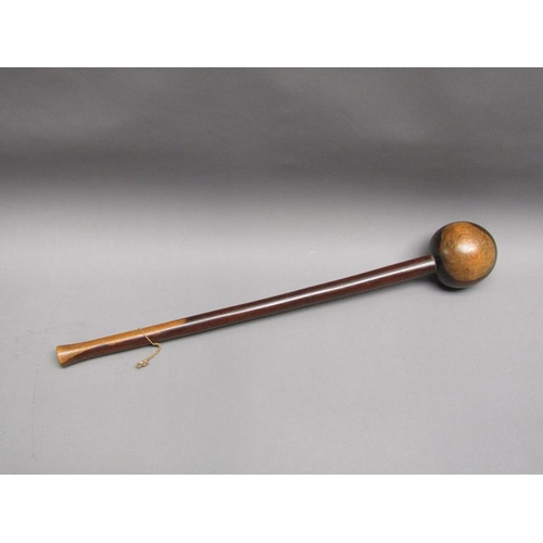 25 - A Lignum vitae throwing club with a ball shaped end, 59cm l.