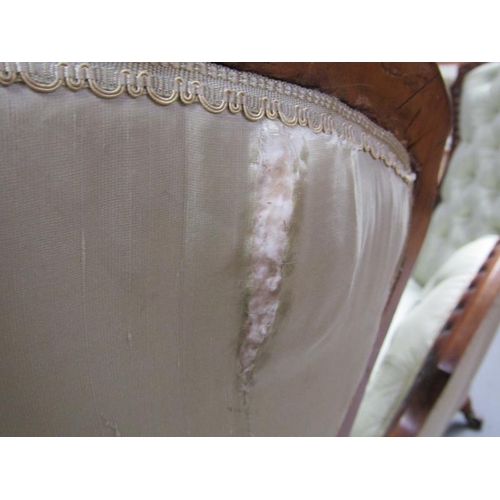 293 - A Victorian walnut show framed and upholstered double end sofa of serpentine form, the framed carved... 