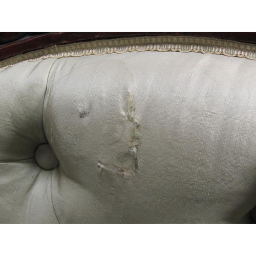 293 - A Victorian walnut show framed and upholstered double end sofa of serpentine form, the framed carved... 