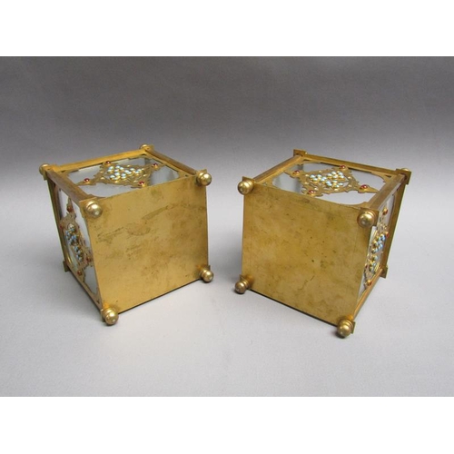 41 - A pair of 19c gilt metal and glass panelled jardinière's decorated with cut brass panel motifs with ... 