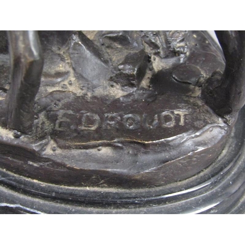 43 - A pair of late 19c black patinated metal gun dog book ends, the pointer dogs on rocky bases with imp... 