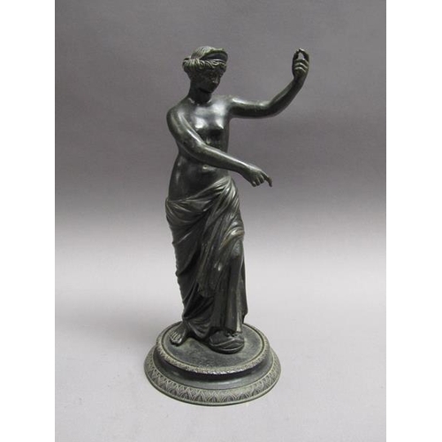 44 - A 19c black patinated bronze figure of Venus de Padua, with a circular stepped base, 26cm h.
