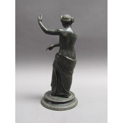 44 - A 19c black patinated bronze figure of Venus de Padua, with a circular stepped base, 26cm h.
