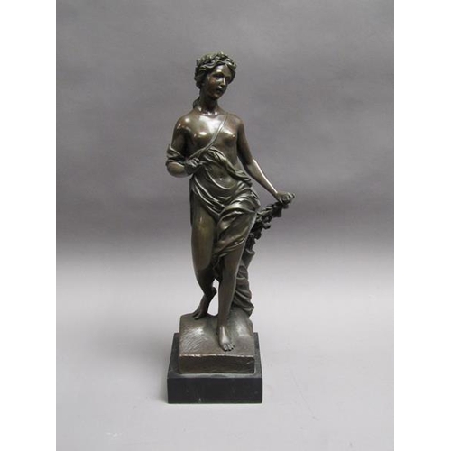 47 - A 19c French patinated bronze figure of a classical female with a spray of leaf and roses in her lef... 