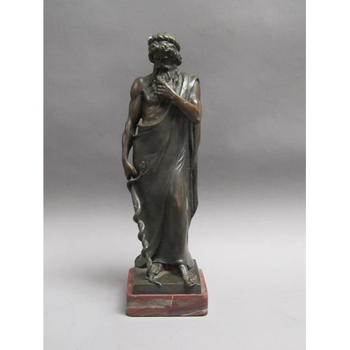 48 - A patinated bronze figure of a robed ancient Asciepius (God of medicine), with the rod of Asciepues ... 