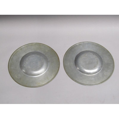 52 - Two 19c pewter platters of circular form with dished centres and etched Coat of Arms, each 30cm diam... 