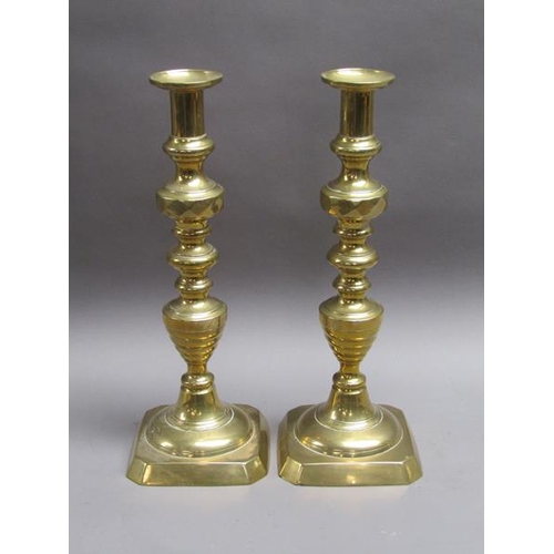 53 - A pair of Victorian brass Jubilee candlesticks, triple knopped on square bases, 38.5cm h.