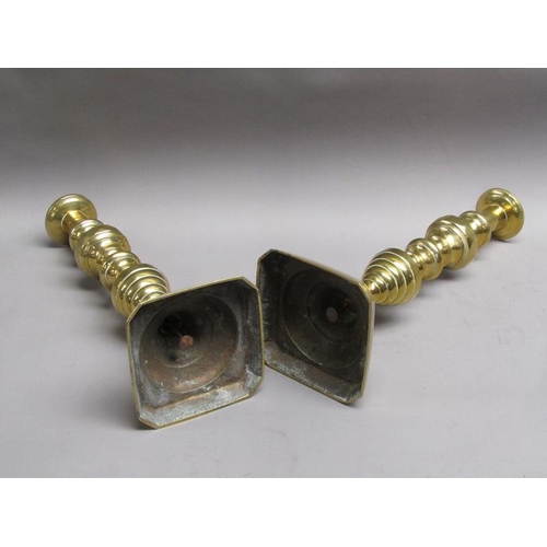 53 - A pair of Victorian brass Jubilee candlesticks, triple knopped on square bases, 38.5cm h.