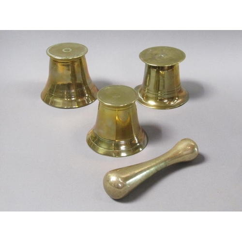 54 - A late 18c/early 19c bronze mortars and a pestle, the mortars, 12.5cm, 13cm & 14cm diam mouths, and ... 