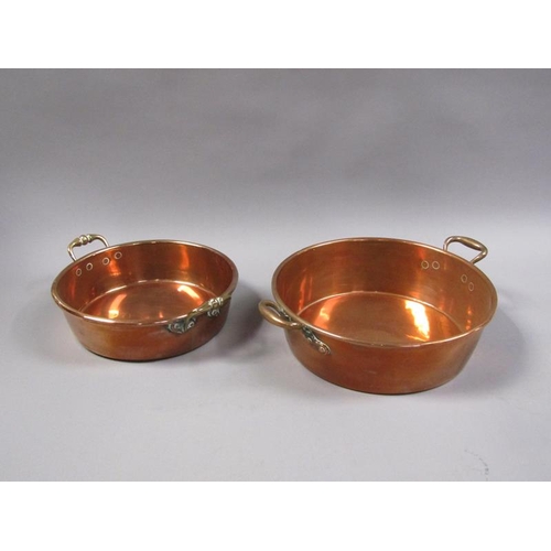 55 - Two 19c copper and brass two handled pans, 40cm & 35cm diam, 7cm & 13cm deep.