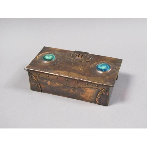 58 - An Arts & Craft copper anodised playing card box of rectangular form with fall front and rising cove... 