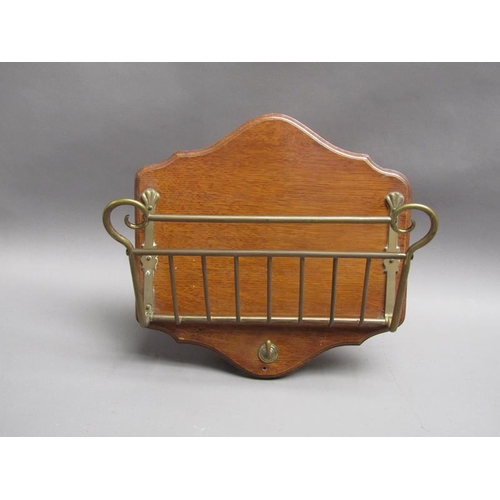 60 - A late 19c/early 20c wall hanging letter rack with brass fittings on an oak panel back, 34cm w, 34cm... 