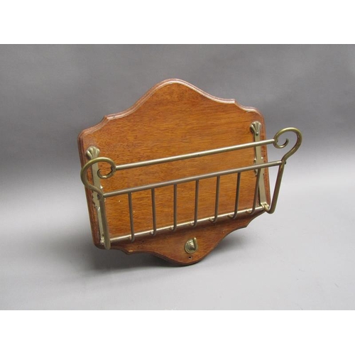 60 - A late 19c/early 20c wall hanging letter rack with brass fittings on an oak panel back, 34cm w, 34cm... 