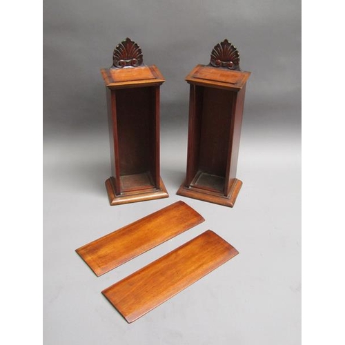 61 - A pair of 19c mahogany table top boxes with rising front panels with shell and scroll carved pedimen... 