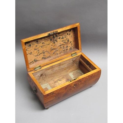 62 - A late Georgian burr walnut veneered caddy box of bombe form with lion mask ring pull side handles a... 