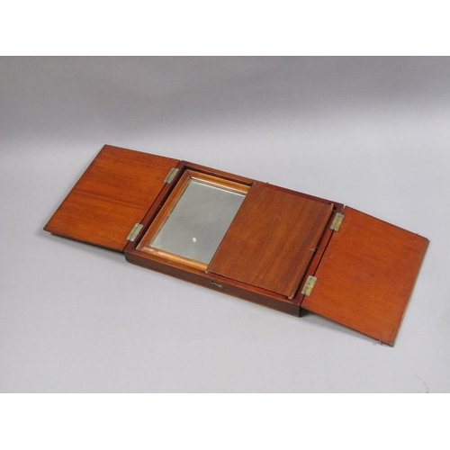 69 - An early 19c Officers campaign folding mirror with a ratchet strut in a mahogany box enclosed by two... 