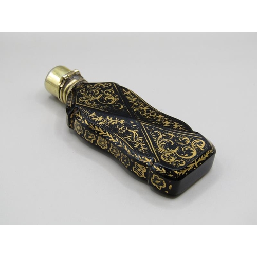 72 - A 19c glass scent bottle of facet form with panels of gilt work and having a gilt metal hinged top, ... 