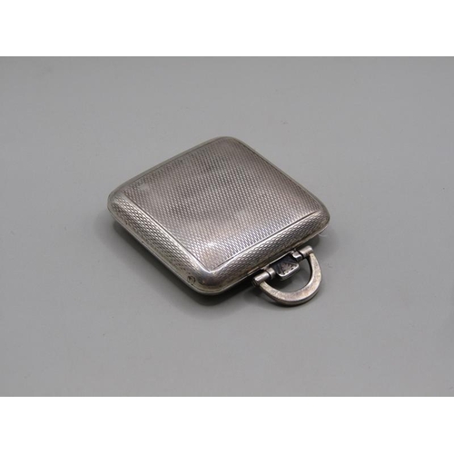 73 - A small Swiss travelling clock in folding silver case made by Sapho and retailed by Elkingtons.  The... 