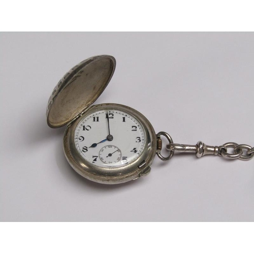 74 - An early 20c Swiss full hunter pocket watch, the base metal case having convex front and back in the... 