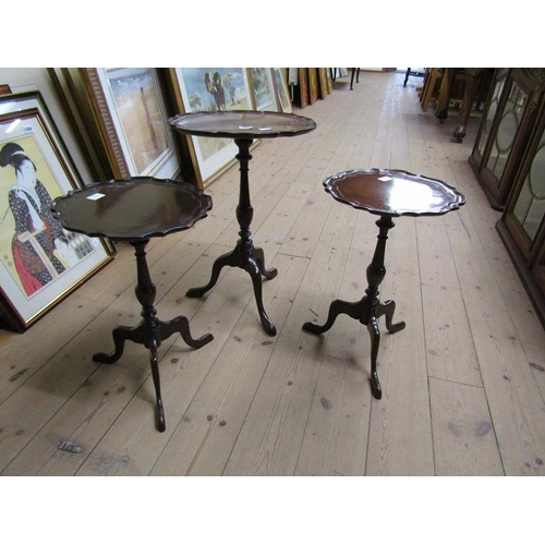 1969 - THREE MAHOGANY PEDESTAL WINE TABLES