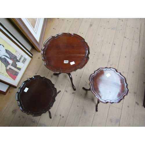 1969 - THREE MAHOGANY PEDESTAL WINE TABLES