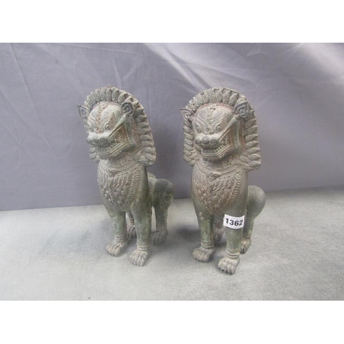 1362 - PAIR OF ORIENTAL BRONZED TEMPLE LIONS 29cms H