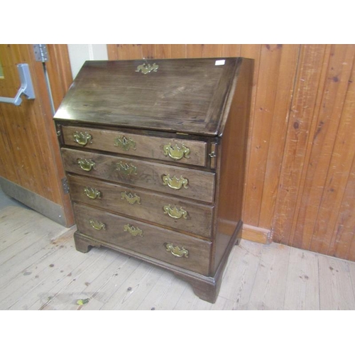 1457 - EARLY 19c MAHOGANY BUREAU WITH FALL FRONT AND FITTED INTERIOR OVER FOUR LONG DRAWERS WITH BRACKET FE... 