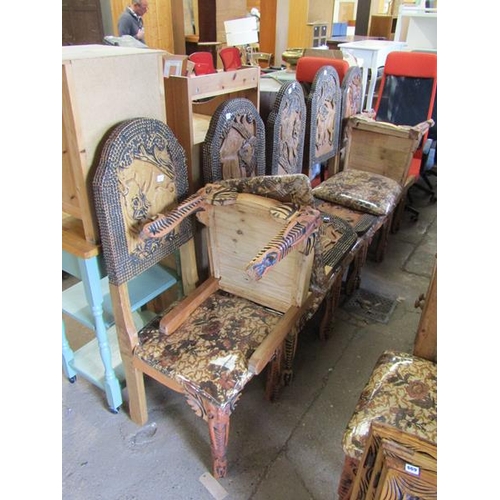 EIGHT CARVED AFRICAN DINING CHAIRS