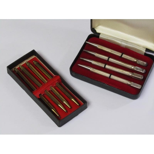 1365 - SET OF FOUR GILT METAL BRIDGE PENCILS; BOXED SET OF FOUR SILVER PLATED BRIDGE PENCILS