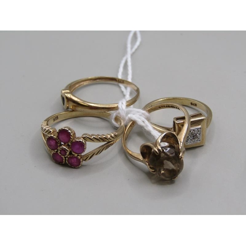 1403 - FOUR 9ct GOLD STONE SET RINGS