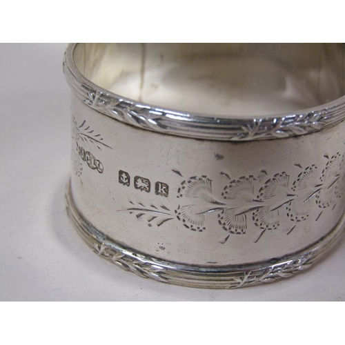 1484 - FOUR SILVER NAPKIN RINGS