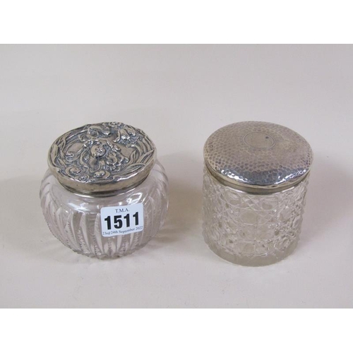 1511 - TWO CLEAR GLASS COSMETIC POTS WITH SILVER COVERS