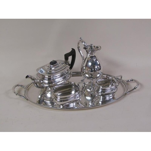 1526 - SILVER PLATED TWO HANDLED TEA TRAY TOGETHER WITH FOUR PIECE TEASET THEREON