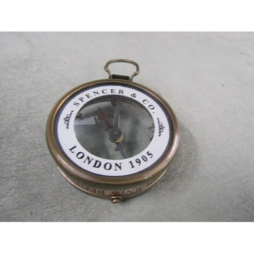 1437 - BRASS COMPASS IN GLAZED WOODEN CASE, CASE 11CM SQ.