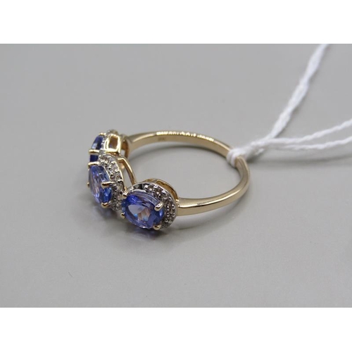 1588 - GOLD THREE STONE TANZANITE AND ZIRCON SET RING, SIZE Q