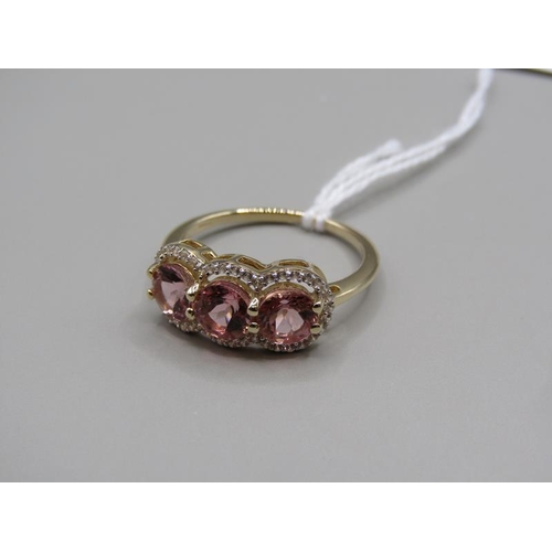 1595 - GOLD THREE STONE PINK TOURMALINE AND ZIRCON SET RING, SIZE Q